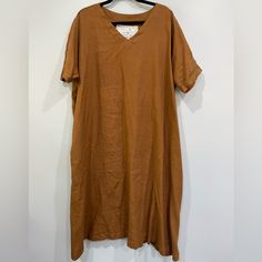 New And Never Worn Berlin Oversized Linen Dress. Color Is Toast (Not A Hw Toast, Mid Weight One) Ptp Of 28” And Length Of 45-46” Truly Oversized (One Size Fits All) Dress Features A Swingy, Trapeze Shape. Drop Shoulder, Elbow-Length Sleeves, And Pockets. Wide V Neckline. Drapes And Moves Beautifully, Hanging Comfortably Away From The Body. Perfect For Creating That Voluminous, Oversized Look. Well-Suited To Sizes S Through L/Xl. This Beauty Comes With The Belt And Is The Most Comfortable Oversiz Brown Oversized Short Sleeve Dress, Oversized Brown Dresses For Daywear, Oversized Brown Dress For Daywear, Brown Oversized Dress For Daywear, One Size Fits All Dress, Oversized Style, Elbow Length Sleeve, Linen Dress, Drop Shoulder