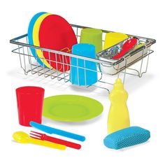 a basket filled with different colored dishes and utensils next to a dishwasher