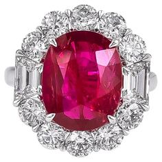 Sophia D platinum ring that features a 6.06 Carat Ruby accentuated with 1.49 carat round diamonds and 0.79 carat baguette diamonds. The ring size is a 6.5 and available for resizing. Sophia D has been known world-wide for over 40 years because of its rich history of design and quality craftsmanship. From art deco to antique reproduction, these timeless pieces, when merged with modern manufacturing techniques, create a perfect harmony between old and new Gia Certified Baguette Cut Ruby Ring, Luxury Ruby Ring With Diamond Baguette Cut, Luxury Diamond Ruby Ring With Baguette Cut, White Gold Ruby Ring With Baguette Diamonds, Baguette Cut Ruby Ring With Diamond Center Stone, Baguette Cut Ruby Ring With Diamond, Luxury Ruby Ring With Baguette Diamonds For Anniversary, Luxury Ruby Ring With Baguette Diamonds, Sophia Watts