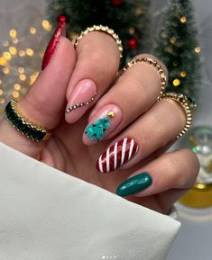 festive christmas nail art. winter holiday nail designs. christmas tree candy cane nails. Xmas nails Holiday Nail Designs Christmas, Nail Art Winter, Christmas Tree Candy Cane, Nail Designs Christmas, Holiday Nails Winter