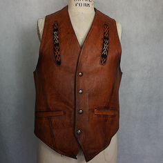 The Brown Leather Is Really Worn In With Time And Oils In A Really Great Way. It Is Seen Fitted Here On A Size 8 Dress Form (36”Bust 26”Waist). I Would Say It’s A Men’s Size Small. Has Inlaid Embroidery Details And Snap Buttons Biker Vest, Leather Vest, Size 8 Dress, Dress Form, Clothing Styles, Embroidery Details, Mens Clothing, Leather Tooling, Vintage Leather