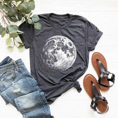 Moon Shirt for Women, Celestial Full Moon T-Shirt, Fall Clothing Gift for Her, Unique Moon Graphic Tee, Galaxy Outer Space T-shirt, Moon Tee ⭐Please Check All Photos For Details.   🐞Choose Your T-Shirt Size From The Drop-Down Lists Next To The item Picture   ⭐Choose Of Your T-Shirt Color From The 2nd Picture   🐞Use "Add message to Seller" link On The Checkout Page To Send me the Following important Details For Your Order's Customization.   ⭐Shipping Time Varies by location (we are located in S Casual Short Sleeve T-shirt With Moon Print, Cotton Crew Neck Top With Moon Print, Summer Moon Print Crew Neck Top, Casual Moon Print Short Sleeve T-shirt, Casual Cotton T-shirt With Moon Print, Casual Crew Neck Top With Moon Print, Casual Relaxed Fit T-shirt With Moon Print, Graphic Tee Shirt With Moon Print, Relaxed Fit Graphic Tee With Moon Print