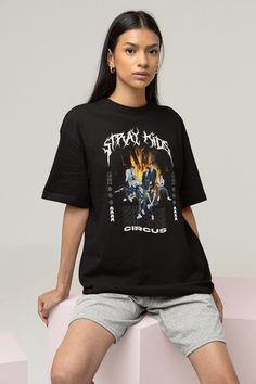 "Stray Kids Circus T-shirt, Stray Kids Maniac Shirt, Kpop Shirt, Kpop Merch, Stray Kids Stay, SKZ Streetwear, Korean Kpop, Seventeen, Exo This t-shirt is everything you've dreamed of and more. It feels soft and lightweight, with the right amount of stretch. It's comfortable and flattering for both men and women. * 100% Printed In The U.S.A - Ship Worldwide. Safe & Secure Checkout. * 100% combed and ring-spun cotton (heather colors contain polyester) * Fabric weight: 4.2 oz (142 g/m2) * Shoulder- Character Print T-shirt For Spring Streetwear, Hip Hop Cotton Tops With Character Print, Trendy Character Print Shirt For Streetwear, Y2k Cotton T-shirt With Character Print, Y2k Style Cotton T-shirt With Character Print, Kpop Cotton Tops With Screen Print, Spring Y2k Style T-shirt With Character Print, Trendy Graphic Design Tops For Fan Merchandise, Kpop Style Crew Neck Cotton Shirt