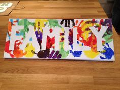 a painting with the words family painted on it and two years ago written in different colors