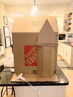 an open cardboard box sitting on top of a counter