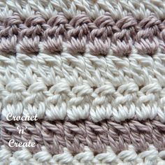 the crochet pattern is shown in shades of white and grey, as well as brown