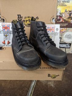 This model of Dr Martens is one that has not been made for many a year. This leather finish was not produced for very long and models that were made using it were only made in small quantities. This leather has a natural buffed pull up finish. It's primarily black in colour but as it ages the leather gives you a vintage look. They are 6 holes in height and have trademark cushioned sole. These are a UK size 3, European 36,ladies USA 5 Industrial Style Leather Boots With Round Toe, Industrial Leather Boots With Round Toe, Vintage Lace-up Martin Boots With Leather Sole, Dr Martens Womens Boots Black, Dr Martens Mary Janes, Rare Doc Martens, Dr. Martens 1461, Dr Martens White, Dr Martens Black