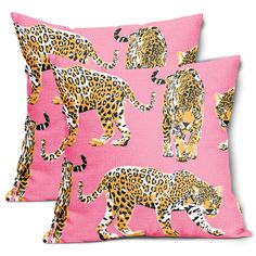 two pink pillows with leopards on them