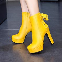 Heel Height: 12 cm Platform Height: 3 cm Shaft Height: 13 cm Color: Black, White, Yellow Size:34,35,36,37,38,39,40,41,42,43,44,45,46,47,48,49,50 Size Guide: Euro/CN 34 = foot length 21.5-22cm (Foot width=8-8.5cm) Euro/CN 35 = foot length 22-22.5cm (Foot width=8.5cm) Euro/CN 36 = foot length 22.5-23cm (Foot width=8.5-9cm Euro/CN 37 = foot length 23-23.5cm (Foot width=9cm) Euro/CN 38 = foot length 23.5-24m (Foot width=9-9.5cm) Euro/CN 39 = foot length 24-24.5cm (Foot width=9.5cm) Euro/CN 40 = foot Yellow Ankle Boots, Lace Ankle Boots, Lace Up High Heels, Ankle Boots For Women, Spring Boots, Womens Sandals Summer, Stiletto Boots, Womens Summer Shoes, Stylish Boots