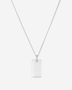 Engravable Rectangle Pendant Necklace in White Gold without engraving. White Diamond Jewelry With Rectangular Pendant, Rectangular White Gold Sterling Silver Necklace, White Gold Sterling Silver Rectangular Necklace, Classic Necklace With Diamond Accents And Rectangular Pendant, Luxury Diamond Necklace With Rectangular Accents, Anniversary Diamond Necklace With Rectangular Pendant, Minimalist Sterling Silver Diamond Necklace With Polished Finish, Classic Rectangular Diamond Accented Necklace, Classic Rectangular Necklace With Diamond Accents