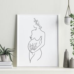 a black and white line drawing of a pregnant woman with flowers in her stomach on a shelf next to potted plants