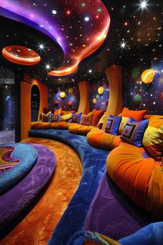 this is a colorful room with lots of pillows on the floor and stars in the ceiling