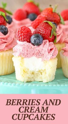 berries and cream cupcakes on a plate with raspberries in the background