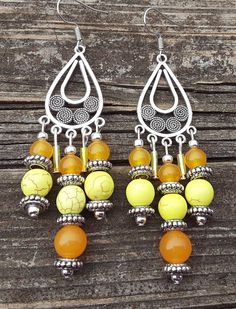 Yellow is such a bright and happy color! These beautiful Earrings  are made with silvertone materials.   Be sure to check out my other items too.  I have amazing deals in my CLEARANCE EARRINGS section! Check them out. Beaded Chandelier, Prom Wedding, Happy Colors, Chandelier Earrings, Earring Gifts, Beautiful Earrings, Statement Earrings, Silver Tone, Everyday Wear