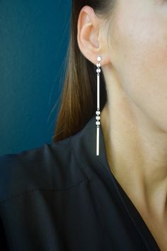 "Extra Long dangle Sterling silver earrings - statement yet minimal geometric earrings. These silver earrings are delicate and playful, they are lightweight, long and skinny and perfect for sensitive ears. They showcase minimal geometric shapes that drop from tiny round flat studs, they move and reflect light that they catch. These elegant, simple earrings will make a beautiful gift.  ► Length (from tip to tip) - 3.86\" (9.8 cm)  ► Stud - 4 mm ●  925 Sterling Silver ●  Made to Order just for you