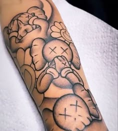 a person with a tattoo on their arm has a clock in the shape of a dog