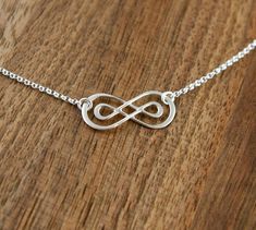 Double infinity necklace in sterling silver by jersey608jewelry Sterling Silver Infinity Necklace In White Gold, Sterling Silver Infinity Necklace With Adjustable Chain, Adjustable Sterling Silver Infinity Necklace, Silver Infinity Jewelry, Dainty Infinity Necklace As Gift For Her, Infinity Jewelry For Mother's Day, Hypoallergenic Sterling Silver Infinity Jewelry, Hypoallergenic Infinity Sterling Silver Jewelry, Silver Infinity Necklace In Dainty Style