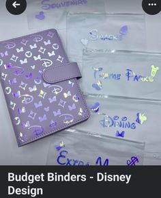 some kind of wallet with the words disney written on it and other items in plastic bags