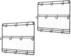 two black metal wall mounted shelves with hooks