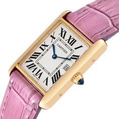 Cartier Tank Louis Yellow Gold Pink Strap Mens Watch W1529756 Box Card. Quartz movement. 18k yellow gold case 25.0 x 33.0 mm. Circular grained crown set with a blue sapphire cabochon. . Scratch-resistant mineral crystal. Silvered opaline dial with black radial Roman numeral hour markers and an inner minute track. Sword-shaped blue hands. Date calendar at 3 o'clock aperture. Secret Cartier signature at VII. Bright pink leather strap with 18K yellow gold tang buckle. Cartier Gold Watch With Rectangular Dial, Gold Cartier Watch With Rectangular Dial, Luxury Gold Cartier Watch, Formal Yellow Gold Rectangular Watch Bands, Formal Rectangular Yellow Gold Watch Bands, Luxury Yellow Gold Watch Accessories With Rectangular Dial, Classic Yellow Gold Cartier Watch Accessories, Luxury Yellow Gold Rectangular Watch Bands, Yellow Gold Watch With Rectangular Dial For Gift