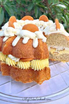 a bundt cake with frosting and icing on a plate