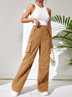 Step into effortless elegance with these Non Stretch Loose Fit Wide Leg Pants. Embrace a timeless silhouette that exudes grace and sophistication, transcending fleeting fashions. Crafted with meticulous attention to detail, these pants boast a loose fit that allows for unrestricted movement and comfort, while effortlessly elongating your legs. The exquisite craftsmanship is evident in every seam, ensuring durability and longevity. Specifications: Style: Casual Pattern Type: Plain Type: Cargo Pan Elegant Wide-leg Pants With Cargo Pockets, Elegant Straight Leg Bottoms With Cargo Pockets, Elegant Trousers With Cargo Pockets, Elegant Wide-leg Cargo Pants, Elegant High-waisted Cargo Pants, Elegant Wide Leg Cargo Pants With Pockets, Elegant Baggy Pants With Pockets, Elegant Bottoms With Cargo Pockets For Spring, Trendy Denim