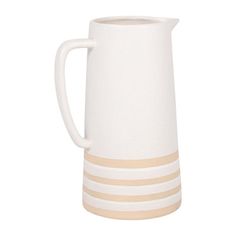 a white and beige striped pitcher on a white background