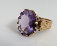 Estate 14k rose gold amethyst ring size 5. a 10mm amethyst stone. great shape. no chips or damage. 2.8 grams. Gold Solitaire Amethyst Ring For Formal Occasions, Heirloom Yellow Gold Amethyst Solitaire Ring, Heirloom Yellow Gold Solitaire Amethyst Ring, Heirloom Amethyst Solitaire Ring In Yellow Gold, Hallmarked Yellow Gold Amethyst Ring, Faceted Amethyst Ring In Yellow Gold Fine Jewelry, Formal Gold Amethyst Ring With Diamond Cut, Formal Gold Faceted Amethyst Ring, Hallmarked 14k Yellow Gold Amethyst Ring