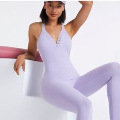 The Seamless One-Piece Jumpsuit is simple yet trendy for any occasion, such as beach, sports, night out and everyday life. Seamless One-Piece Jumpsuit Nylon, Spandex Elastic, comfortable, breathable fabric Sleeveless Tight Fit Color Options: Black, Purple Available Sizes: S to XL Gender: Female Age: Adult Product ID: CJLT155046101 Note: All sizes are 1 to 2 sizes smaller than European and American people. Choose the larger size if your size is between two sizes. Please allow 2-3cm differences du Solid Stretch Sportswear Swimwear, Stretch Jumpsuits And Rompers With Built-in Bra For Sports, Sporty Summer Yoga Bodysuit, Solid Sportswear Unitard For Yoga, Sportswear Unitard For Yoga, Sportswear Style Unitard For Yoga, Purple Stretch Swimwear For Yoga, High Stretch Bodysuit For Sports In Summer, Sports Sleeveless Jumpsuits And Rompers With Built-in Bra