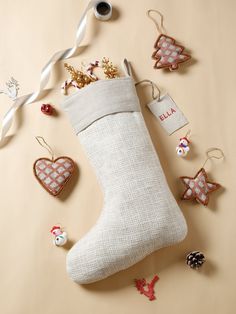 a stocking filled with christmas ornaments and decorations