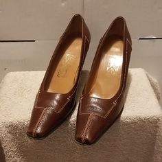 Ferragamo Florence Salvatorre Leather Pointed Pumps Sz 6.5aa, Pre Owned In Great Condition, Brown/Burgandy Color, Last Picture Shows A Faded Spot Looks Like A Scratch But Its Not You Dont Feel It But You Can See It, No Box Or Dust Bag. Made In Italy. Smoke/Pet Free Home. Classic Heels With Leather Sole And Snip Toe, Brown Slip-on Calf Leather Heels, Classic Leather Heels With Snip Toe, Vintage Leather Heels With Heel Tab, Brown Formal Heels With Snip Toe, Formal Brown Snip Toe Heels, Leather Heels With Medium Width And Snip Toe, Luxury Leather Snip Toe Heels, Brown Calf Leather Square Toe Heels