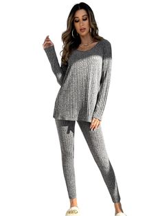 This Knit Split Hem Top And Leggings Lounge Set is the ideal combination of comfort and style. The top has a relaxed cut with a split hem, giving it a modern look. The lightweight fabric is soft to the touch, making it ideal for lounging or running errands. This set is apt for the fashionista who wants to stay comfortable while still looking stylish. Features: Style: Casual Pattern Type: Plain Type: Pant Sets Material: Fabric Pants & Tops Composition: 100% Polyester Pants Body: Unlined Color: Br Comfortable Leggings For Loungewear, Ribbed Casual Leggings For Loungewear, Casual Ribbed Leggings For Loungewear, Casual Ribbed Leggings For Fall, Gray Leggings For Loungewear, Comfortable Relaxed Fit Leggings For Loungewear, Cozy Fit Fall Leggings For Loungewear, Relaxed Fit Leggings For Fall Loungewear, Ribbed Winter Leggings For Loungewear