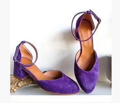 "❣ PRODUCT DESCRIPTION ♥Purple Suede Ankle Strap Pumps♥ Handmade to order premium purple suede leather shoes. Add a bit of color to ensembles in need of a boost!  Handcrafted in Greece This pair of suede pumps is handmade and is the perfect gift for women to attend certain events. We made these block mid-heeled shoes using premium suede leather to ensure the high quality of these shoes that you'll want to be with at every event. This pair of ankle strap pumps are durable, long-lasting, high quality, lightweight, and full mold to standard foot sizes.  You can get an attractive, stylish, gorgeous, modern, and trendy look by wearing these shoes. It is very comfortable and elegant.   The soft leather, and antimicrobial bottom, combined with the non-slippery sole, makes walking light and soft. Purple Heels With Heel Strap And Round Toe, Purple Low Heel Heels With Heel Strap, Purple Low Heel Shoes With Strap, Purple Closed Toe Heels With Heel Strap, Purple Closed Toe Heels With Strap, Soft Dramatic, Ballerina Pumps, Mid Heel Shoes, Suede Leather Shoes