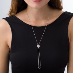 Complement your attire with this dazzling diamond lariat bolo necklace. Crafted in sterling silver, this adjustable style features a quartet of shimmering diamonds - each artfully set to enhance size and sparkle - wrapped in a polished ribbon and another frame of diamonds. Vary the look by re-centring the bolo design along the lariat chain. Radiant with 1/10 ct. t.w. of diamonds and a brilliant buffed luster, this wheat chain necklace adjusts up to 26.0 inches in length and is finished with open tilted cushion-shaped drops. Formal Silver Diamond Lariat Necklace, Adjustable Diamond Necklace With Diamond Accents, Elegant Silver Lariat Necklace With Diamond Cut, Luxury Sterling Silver Lariat Necklace, Minimalist Diamond Lariat Necklace, Elegant Adjustable Diamond Necklace, White Gold Diamond Lariat Necklace With Adjustable Chain, White Gold Diamond Lariat Necklace With Accents, Formal Lariat Jewelry With Cubic Zirconia