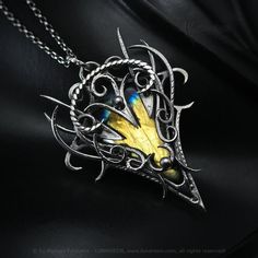 "NYFEGRNIS - Exclusive, Gothic, Fantasy-style necklace. Fully handmade work (wire-wrapping technique with oxidizing and polished silver). Main base gem: African Labradorite. Material: silver (Sterling Silver, Fine Silver / 925, 999). We use only high-quality silver. No \"German Silver\" - our silver does not contain harmful nickel. Sterling Silver chain (optional), length: 42 cm + 7 cm (Rolo) with a decorative clasp, adjustable. Pendant length: 5,7 cm (incl. bail), width: 4,2 cm. Necklace weight Handmade Gold Necklaces For Fantasy Events, Gothic Wire Wrapped Jewelry Gift, Fantasy Style Wire Wrapped Jewelry Gift, Fantasy Wire Wrapped Jewelry As Gift, Fantasy Wire Wrapped Jewelry Gift, Handmade Pendant Necklace For Fantasy Events, Unique Handmade Necklaces For Fantasy Events, Wire Wrapping Techniques, Fantasy Style