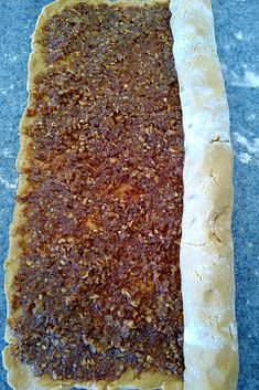 an uncooked pastry sitting on top of a counter