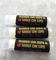 three lip bales with the words, hands on hipss and smile on lips