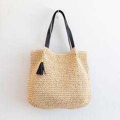 Elena Handbags Straw Woven Tote with Leather Straps and Tassel Black Bags With Tassels For Summer, Black Tassel Bags For Summer, Travel Crochet Shoulder Bag With Tassels, Everyday Crochet Tote Bag With Tassels, Summer Fringe Bag For Everyday Use, Tassel Crochet Tote Bag For Travel, Crochet Tote Bag With Tassels For Travel, Black Beach Bag With Tassels, Casual Everyday Bag With Tassels