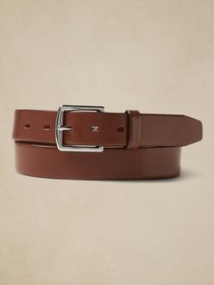 A versatile dress belt, made in luxurious, smooth and sturdy Italian leather.  Approximately 1. 25" wide. Classic Bridle Leather Belt Buckles For Workwear, Classic Leather Belt Buckles For Business Casual, Classic Bridle Leather Belt With Removable Buckle, Elegant Leather Belt With Smooth Grain, Classic Business Belt In Bridle Leather, Classic Leather Belt And Suspenders, Classic Brown Bridle Leather Belt, Classic Bridle Leather Business Belt, Classic Bridle Leather Belt For Business