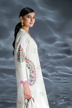 Brand: NishatProduct Code: 42401364Collection: Nishat Unstitched Spring Summer Eid EditionFabric: Cambric Product Detail:Abstract Patterns Printed Style Shirt with Dupatta and Trousers SHIRTPrinted Cambric Shirt: 3 Meter4 Embroidered MotifsFabric: CambricColor: Off White DUPATTABlock Printed Khadi Silk Dupatta: 2.5 MeterFabric: Khadi SilkColor: Off White TROUSERSDyed Cambric Trousers: 3 MeterFabric: CambricColor: Off White DISCLAIMER:* Lining, Laces, and Tassels are not included in unstitched variants.* Embellishment items in stitched outfits are subject to market availability.* The actual colors of the outfit may vary from the colors being displayed on your device. CARE INSTRUCTIONS: Extra Fabric Has Been Used For Shoot Original Color May Vary Slightly From The Picture Dry Clean Recommend Alkaram Studio, Silk Dupatta, Extra Fabric, Fabric Stores Online, Style Shirt, Designer Suits, Pakistani Fashion, Nice Tops, Formal Wear