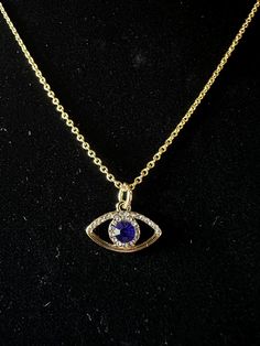 14 karat gold evil eye necklace on 18 inch chain Yellow Gold Evil Eye Round Necklace, Gold Eye Necklace With Diamond Eyes, Yellow Gold Evil Eye Round Pendant Necklace, 14k Yellow Gold Evil Eye Necklace, Yellow Gold Eye Necklaces With Diamond Eyes, Yellow Gold Evil Eye Pendant Necklace, Elegant Gold Evil Eye Necklaces, Elegant Gold Evil Eye Necklace, 14k Gold Evil Eye Charm Necklace