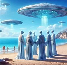 some people are standing on the beach with aliens