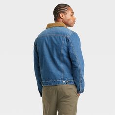 This Faux-Shearling Lined Denim Trucker Jacket from Goodfellow & Co™ is perfect for cold weather. Tailored in a casual fit, this denim trucker jacket in blue sports a classic collared neckline with front buttons, French cuffs and buttoned flap pockets and side pockets for functional style. The heavyweight fabric with faux-shearling lining offers cozy comfort, and you can layer it over a range of outfits buttoned up or down to create a variety of looks. Goodfellow & Co™: Feel good in what you wea 90s Baggy, Functional Style, Denim Trucker Jacket, Boys Denim, Recycled Polyester Fabric, Mens Plaid, Boys Long Sleeve, Trucker Jacket, Long Sleeves Jacket