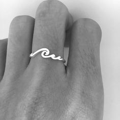 Our Dainty Wave Ring is perfect made for every beach lover and mermaid who dreams of salt in her hair and sun on her skin. Let the waves take you on a journey. PRODUCT DETAILS -------------------------- - Material: solid sterling silver. - Band width is 1.3mm. - Wave length is 15mm. - Wavy Stackable Rings, Adjustable Wavy Rings As A Gift, Pearl Bar Necklace, Wave Jewelry, Crystal Wedding Jewelry, Sterling Silver Jewelry Rings, Silver Pearl Necklace, Nature Ring, Wave Ring