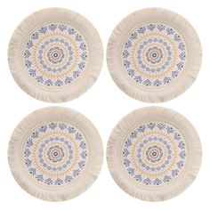 four white and blue plates with fringes on the bottom, one has an orange center