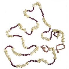 three necklaces and two bracelets with beads