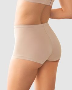 A comfortable fit with no panty lines is here! This boyshort provides a perfect fit that adjusts to your body. It has very few super flat seams for more comfort and no-show wear. Stretch Shapewear Shorts With Soft Touch, Solid Color Shapewear Shorts With Soft Touch, Soft Touch Shapewear Shorts, Shaping Biker Shorts In Solid Color, Stretch Shorts With Built-in Bra, Solid Color Short Boxer Briefs Shapewear, Fitted Soft Touch Boxer Briefs, Seamless Shaping Shorts, Smoothing Shapewear Brief Shorts