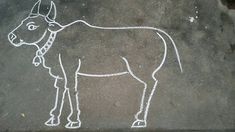 a chalk drawing of a cow on the ground