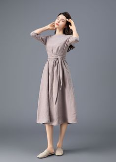 "★★ Welcome to my Ylistyle shop！！！ All our orders are tailor-made for you. specially made for you. I design new styles every week, please collect my store. I believe that you will meet your favorite styles. ★★FEATURES 100% linen fabric No lining Two side pockets Scoop neckline 3/4 sleeve Belt waist dress Midi linen dress Perfect for summer,spring,autumn ★★Mode size Height 170cm (5′ 7″) Bust 84 cm (33\") Waist 66 cm (26\") She wears size XS. ★★ Bespoke Order Service If you Request other color Req Casual A-line Belted Dress For Spring, Chic Beige Solid Color Midi Dress, Spring Midi-length Belted Dress With Pockets, Spring Belted Knee-length Midi Dress, Belted Knee-length Midi Dress For Spring, Spring Knee-length Belted Midi Dress, Spring A-line Belted Dress, Beige Mid-length Dress For Work, Beige Mid-length Workwear Dresses