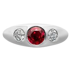 A beautiful platinum, ruby and diamond set ring by Hancocks, set flush to the centre with a lovely Burmese ruby weighing 1.09ct between two smaller old European brilliant cut diamonds weighing 0.40cts in total, within a hand crafted highly polished platinum tapering band. 1.09ct round unheated Burmese ruby with Gem & Pearl Lab report 02018 Platinum with maker's marks and London assay marks 10.5 grams weight UK finger size L 1/2 - supplied in any finger size Burmese Ruby, Gia Certificate, Engagement And Wedding Rings, Set Ring, A Dream Come True, European Cut Diamonds, Vintage Band, Diamond Set, Dream Come True